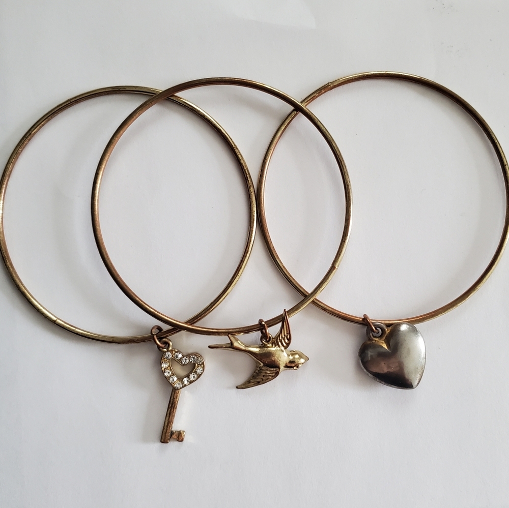 3 gold tone charm bracelets
